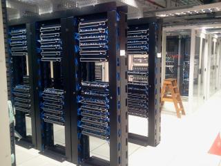 Data centre server racks with environmental and access monitoring