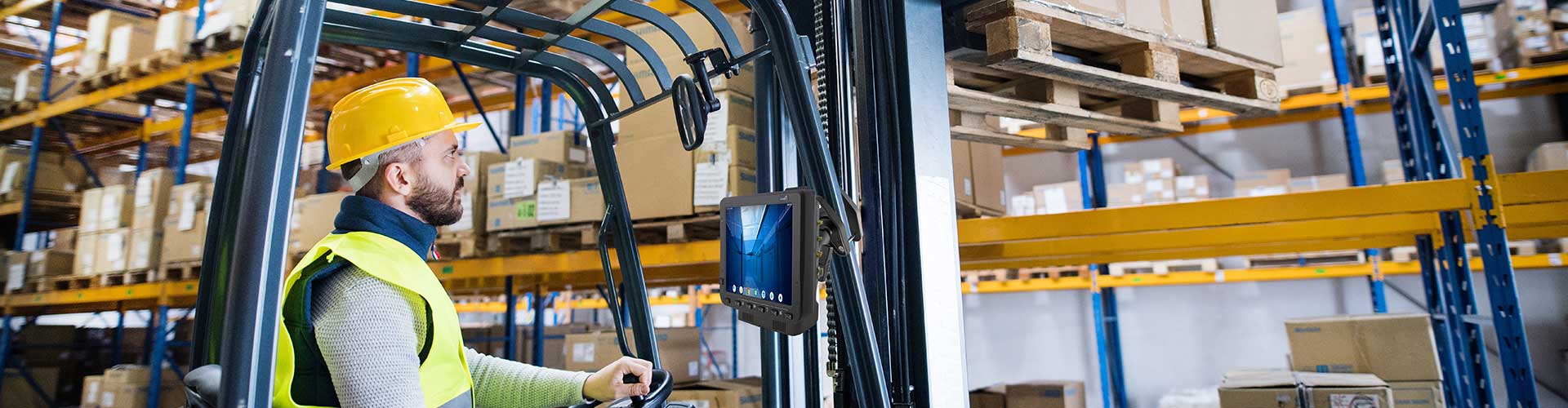 Winmate vehicle-mount rugged computer on a forklift in a warehouse